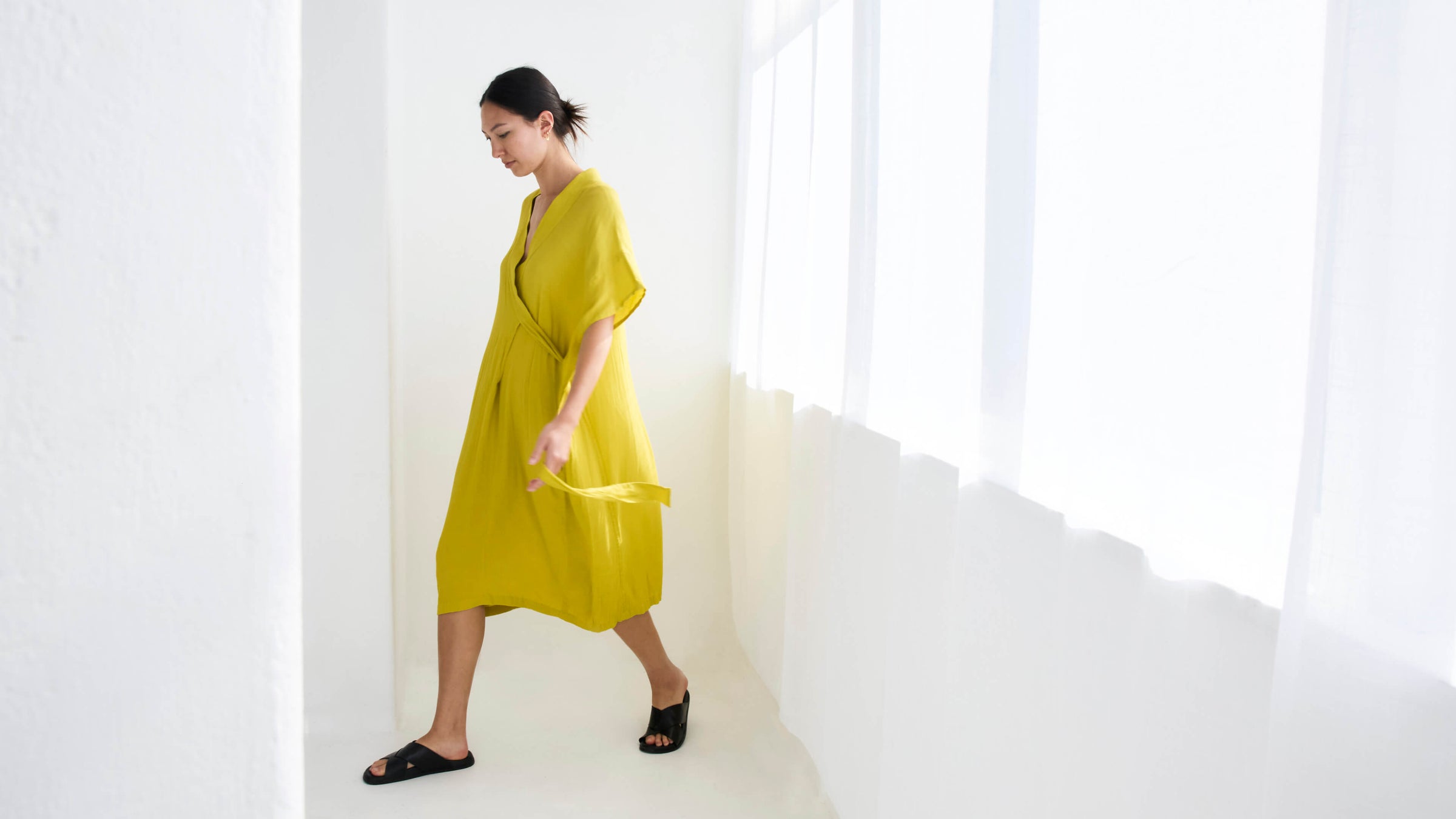 woman wearing a handmade yellow japanese kimono