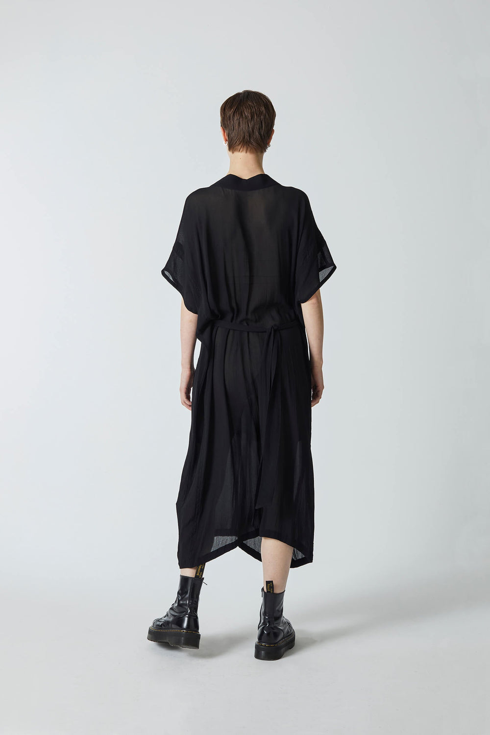 woman wearing a black, handmade, original, japanese inspired, easy-care, kimono dress