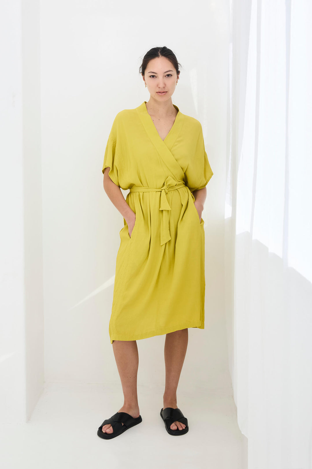 woman wearing a handmade yellow kimono