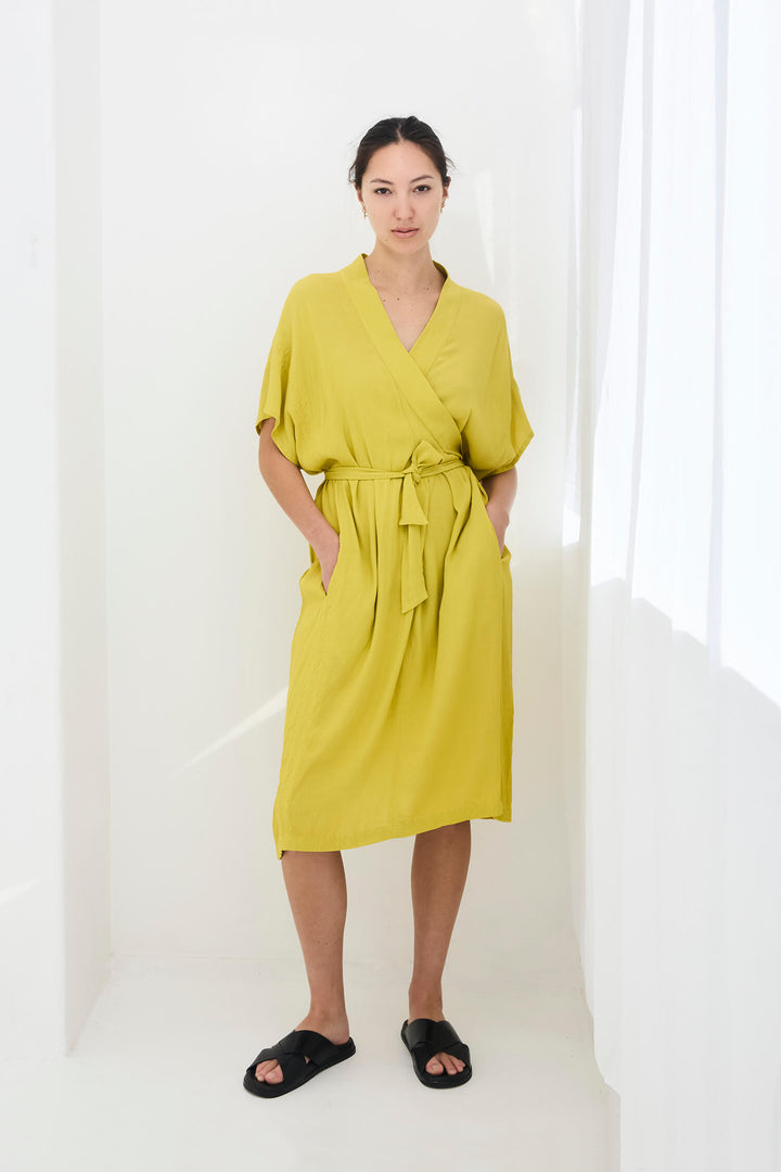 woman wearing a handmade yellow kimono