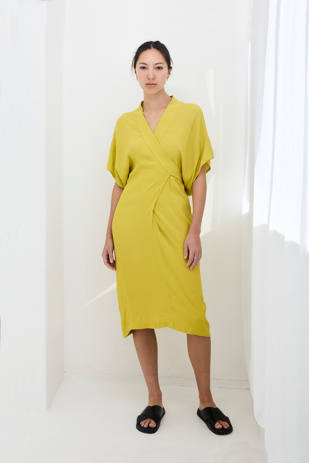 woman wearing a handmade yellow kimono