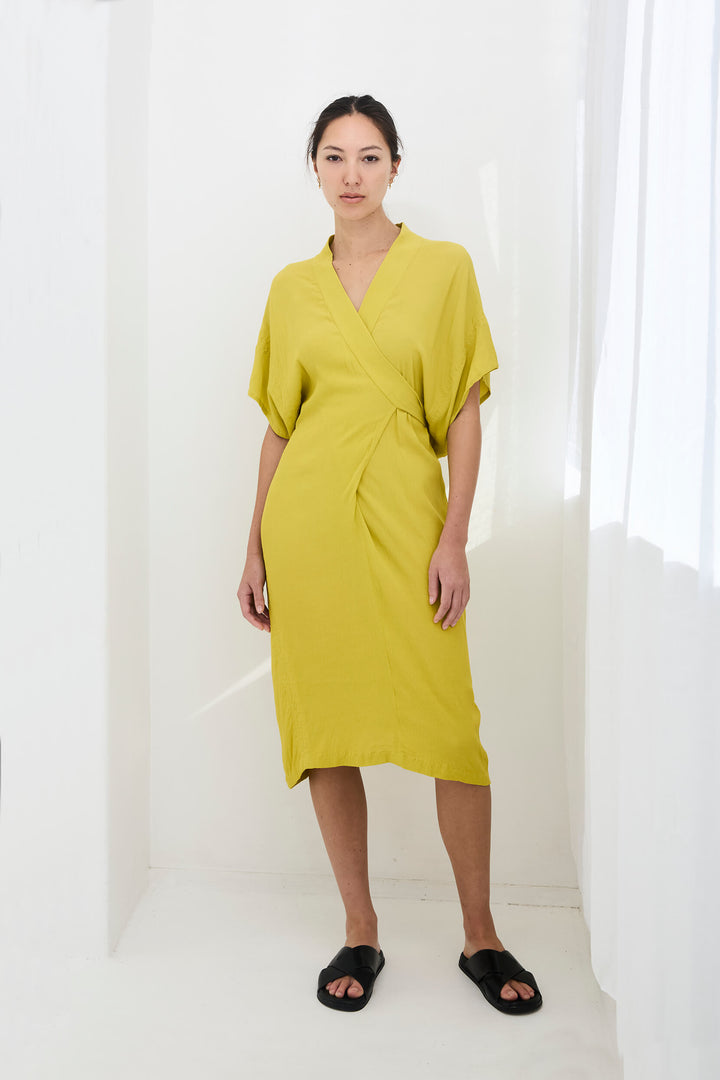 woman wearing a handmade yellow kimono