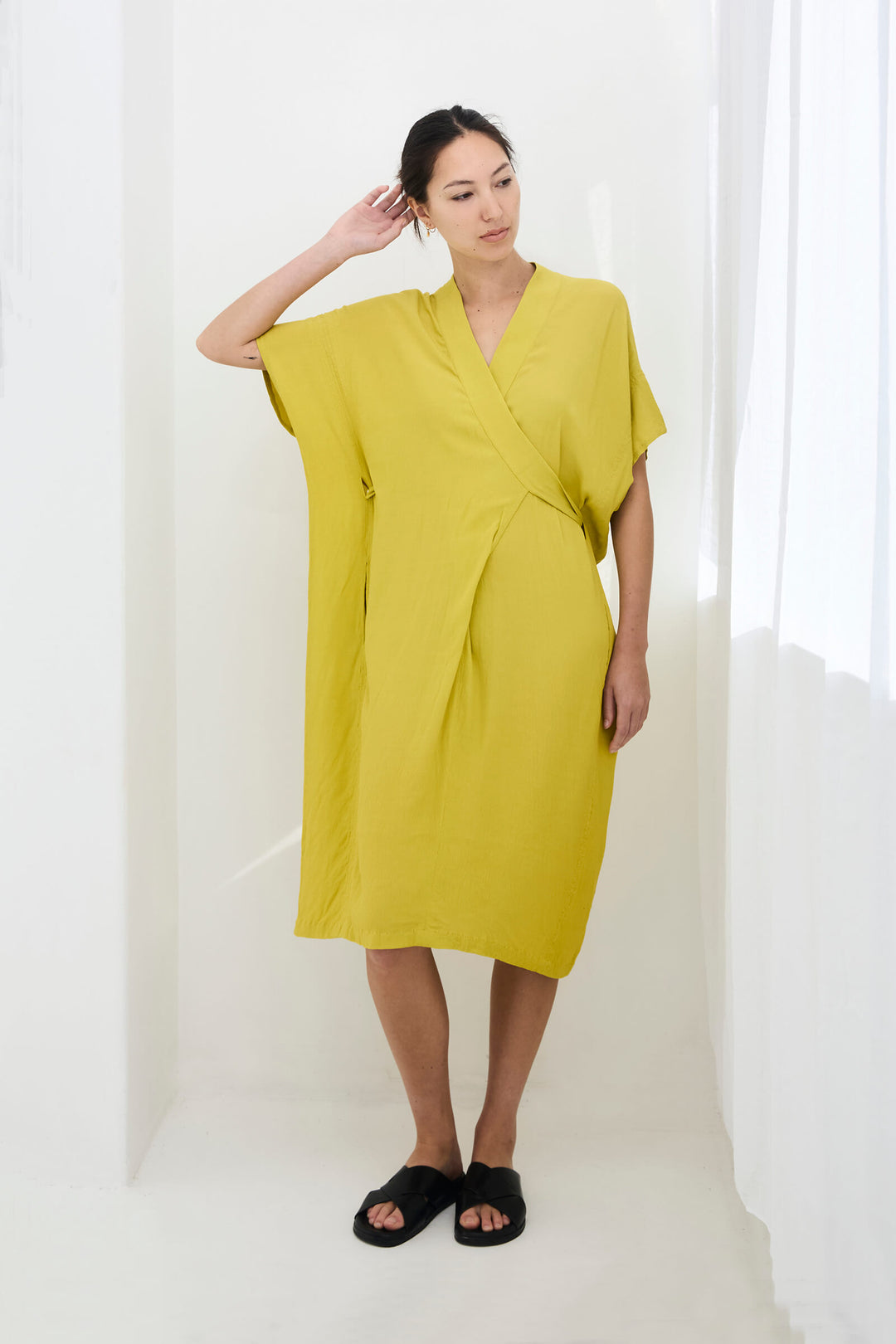 woman wearing a handmade yellow kimono